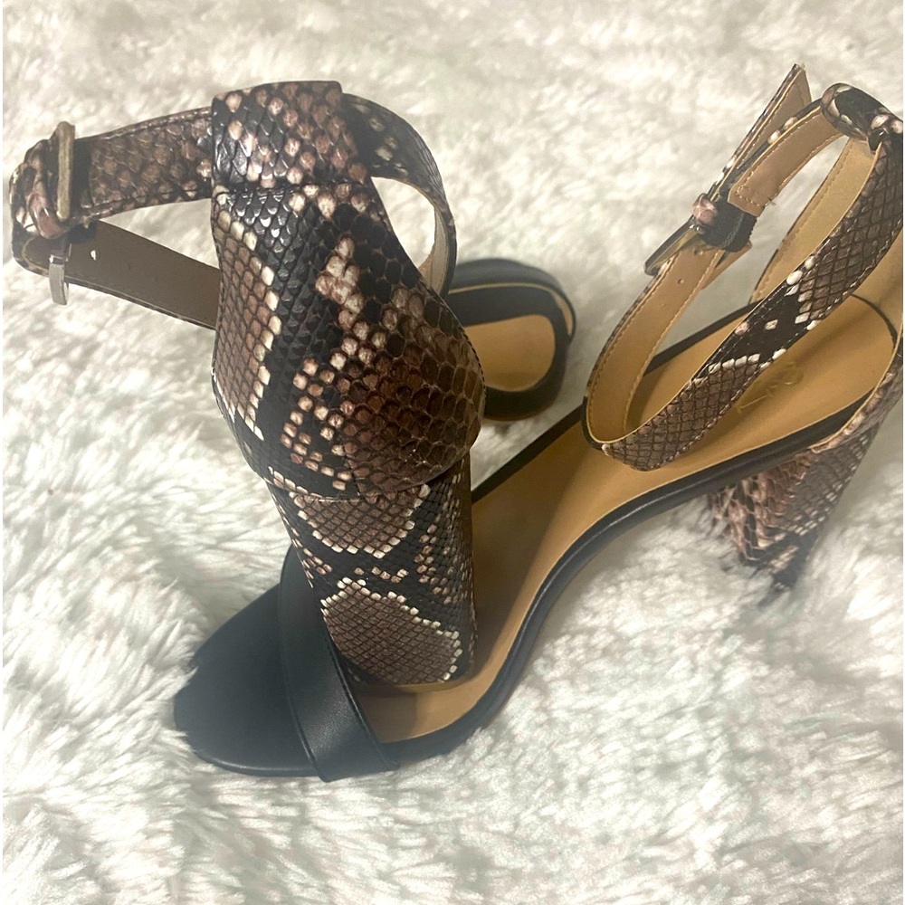 Brand new snake skin and black heeled sandals